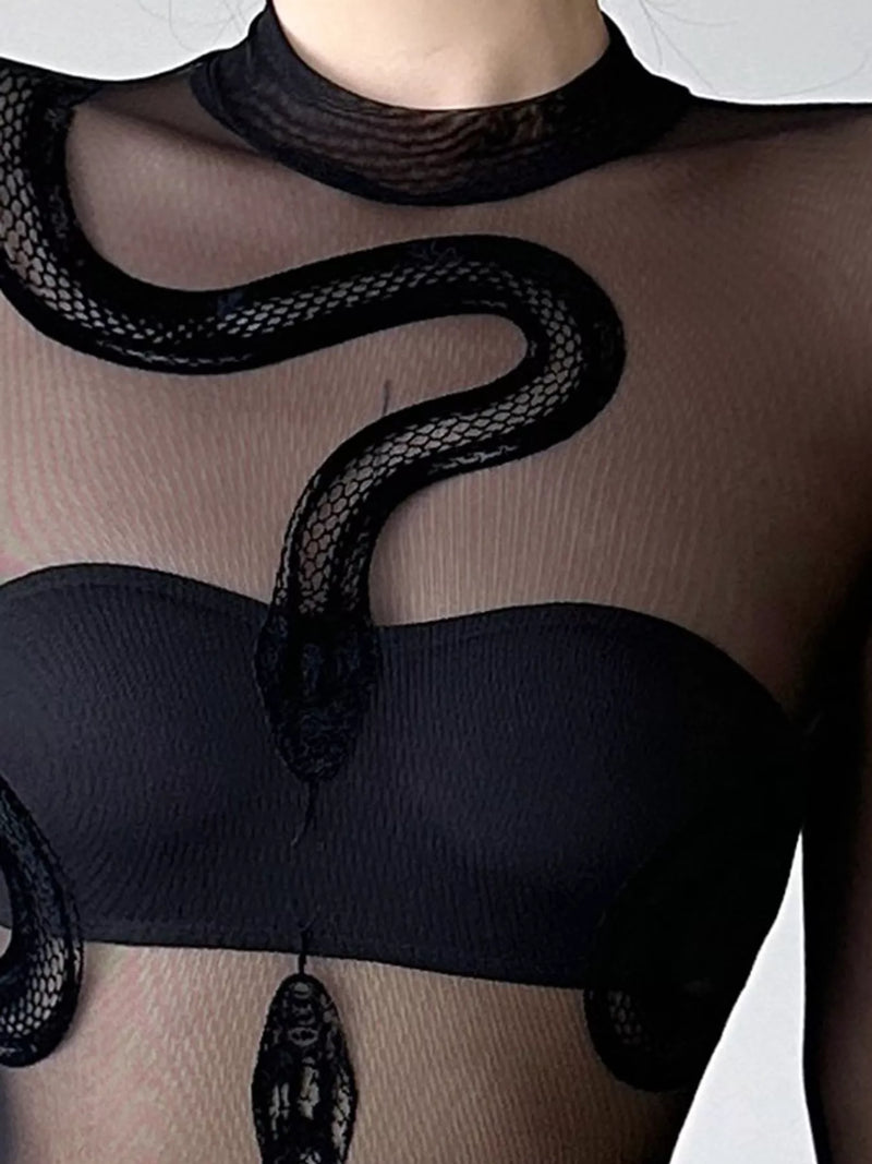Black sheer mesh top with a snake print overlay and black bralette underneath, shown on a model against a light background.