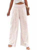 Beige wide-leg pants worn by a person on a white background