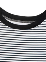 Close-up of a black and white striped shirt with a focus on the collar.