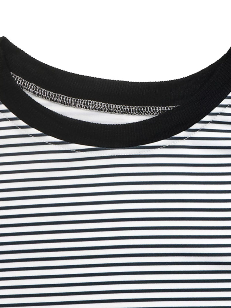 Close-up of a black and white striped shirt with a focus on the collar.