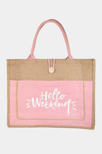 Tote bag with pink front pocket and jute sides, featuring 'Hello Weekend' text.