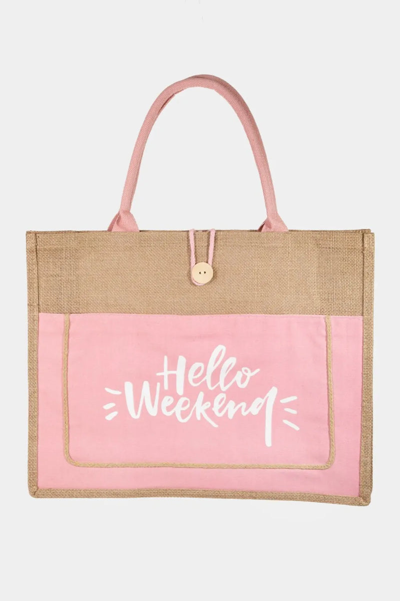 Tote bag with pink front pocket and jute sides, featuring 'Hello Weekend' text.