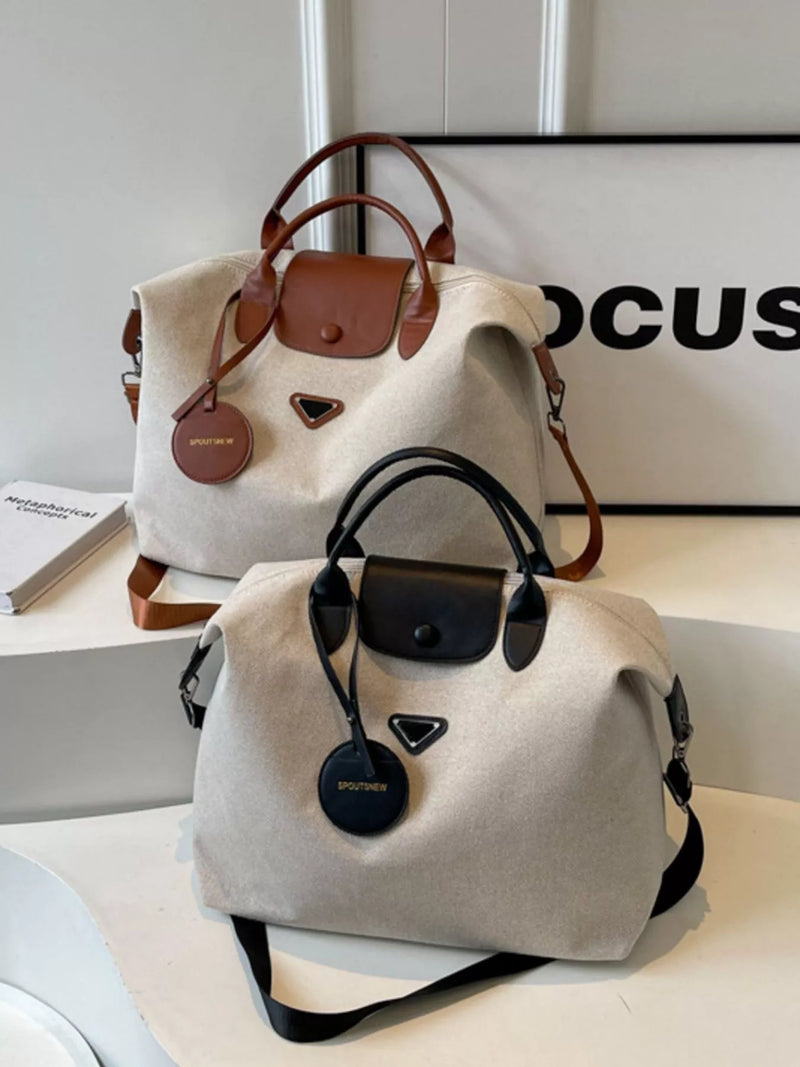 Two beige handbags with brown and black handles on a white surface.
