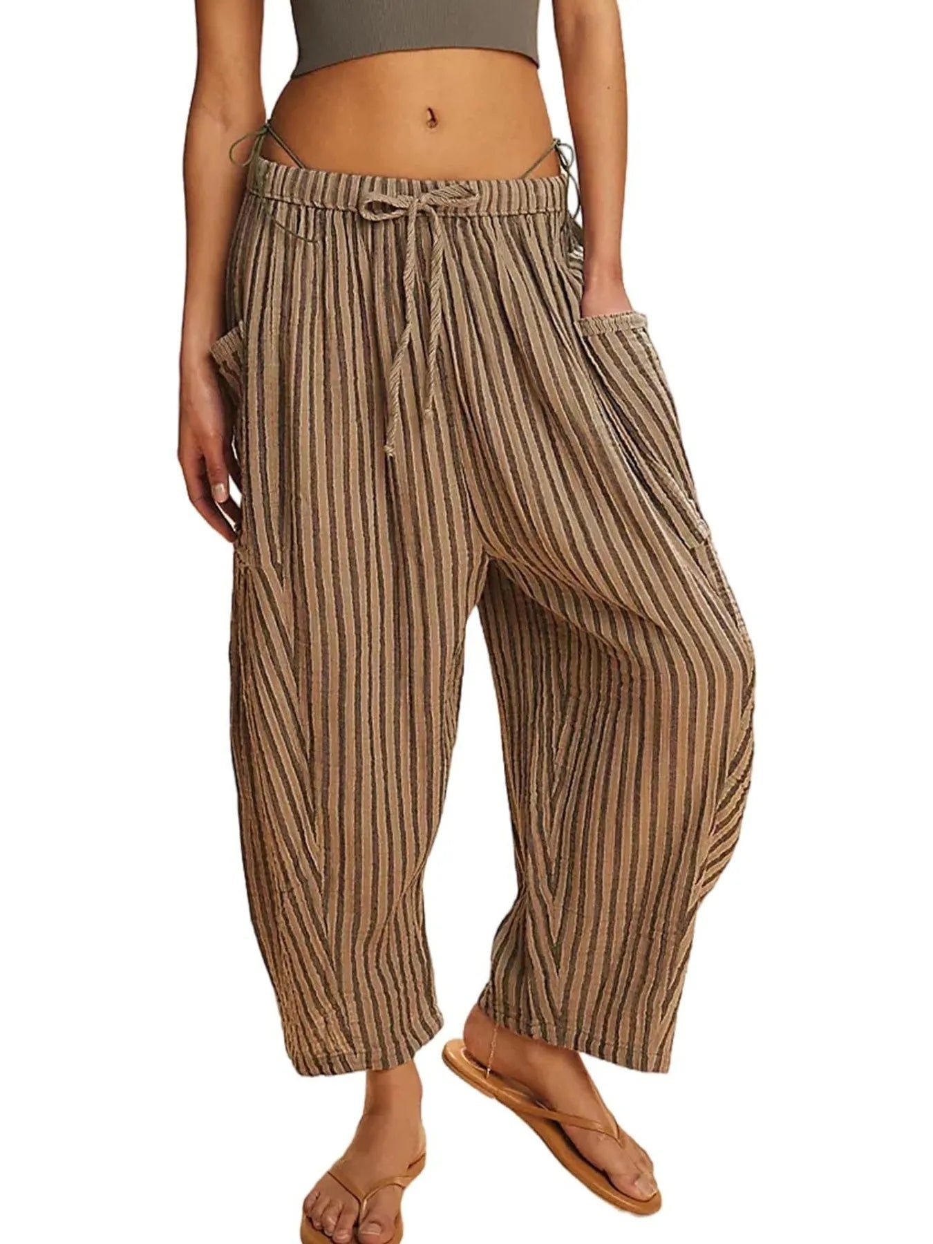 Striped wide-leg pants worn by a person on a white background