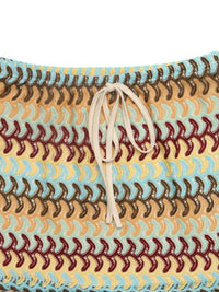 Multicolored woven bag with a drawstring on a white background