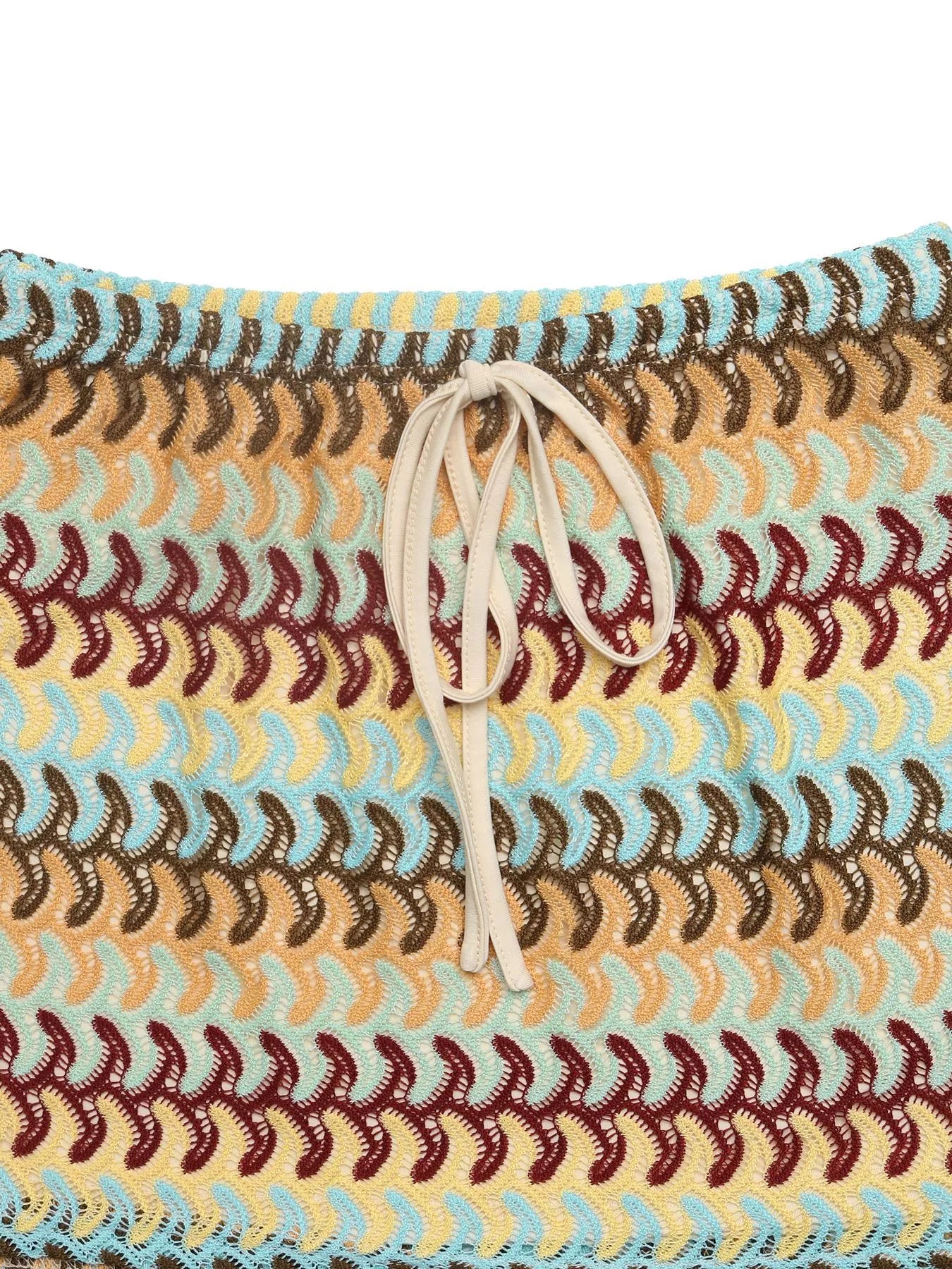 Multicolored woven bag with a drawstring on a white background
