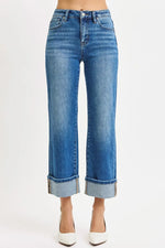 Blue jeans with a white background