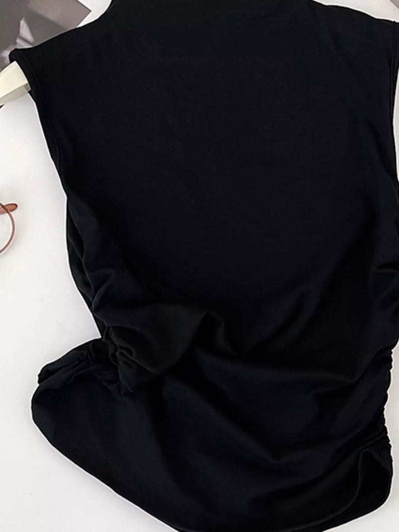 Black fabric with a bow on a white background