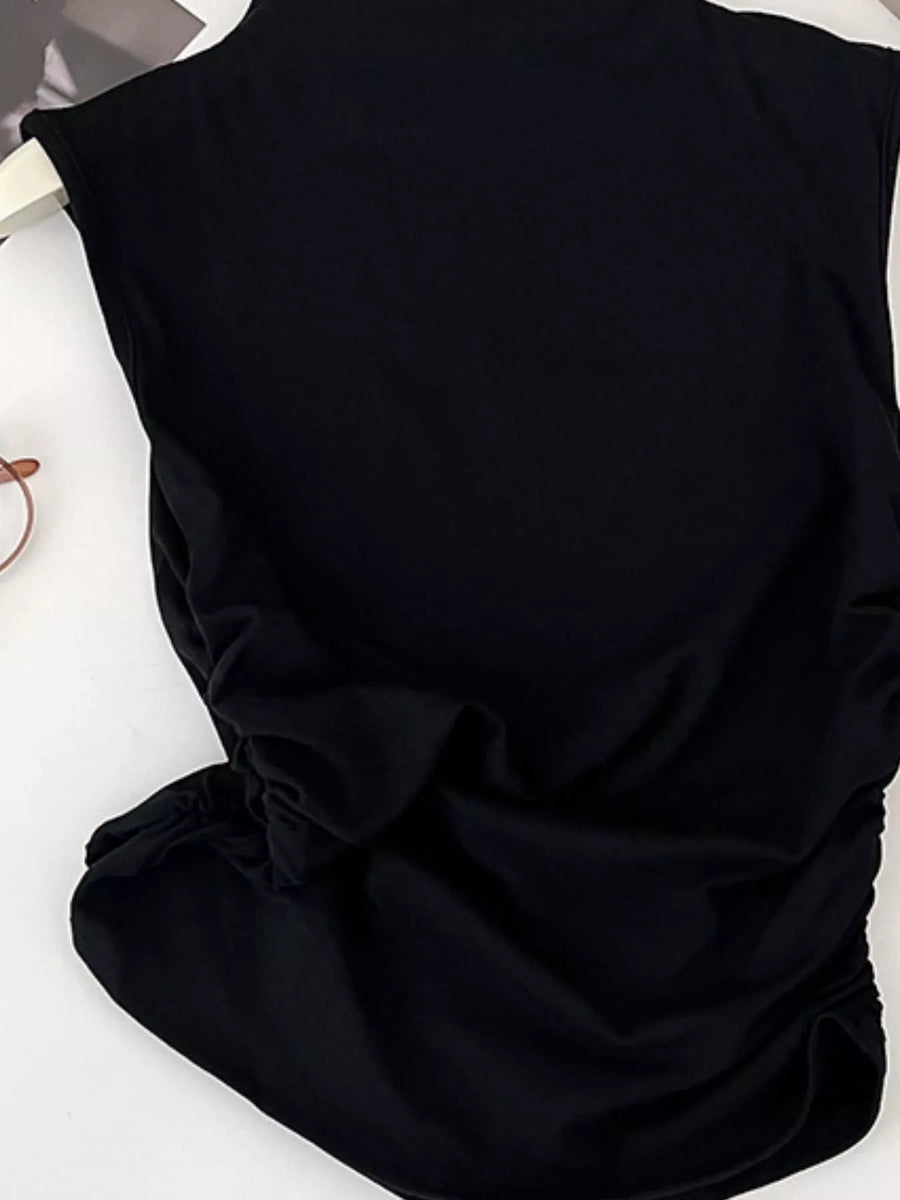 Black fabric with a bow on a white background