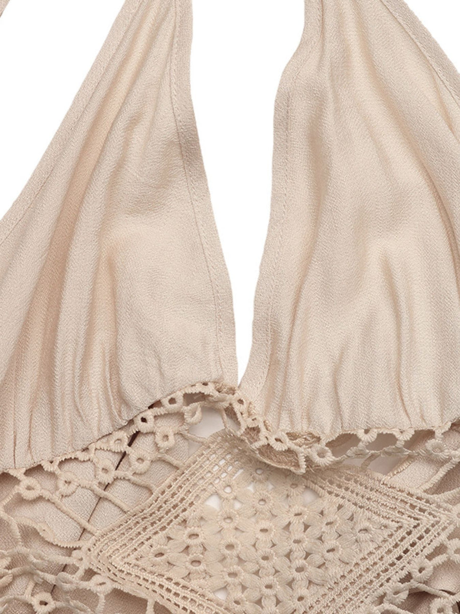 Beige bikini top with lace details on a white background