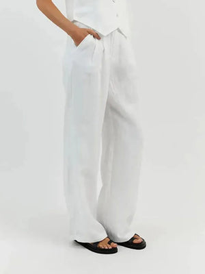 White wide-leg pants worn by a person on a white background