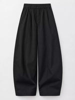 Black wide-leg cropped trousers with a high-waisted, elasticized waistband and front pleats, shown flat on a light gray background.