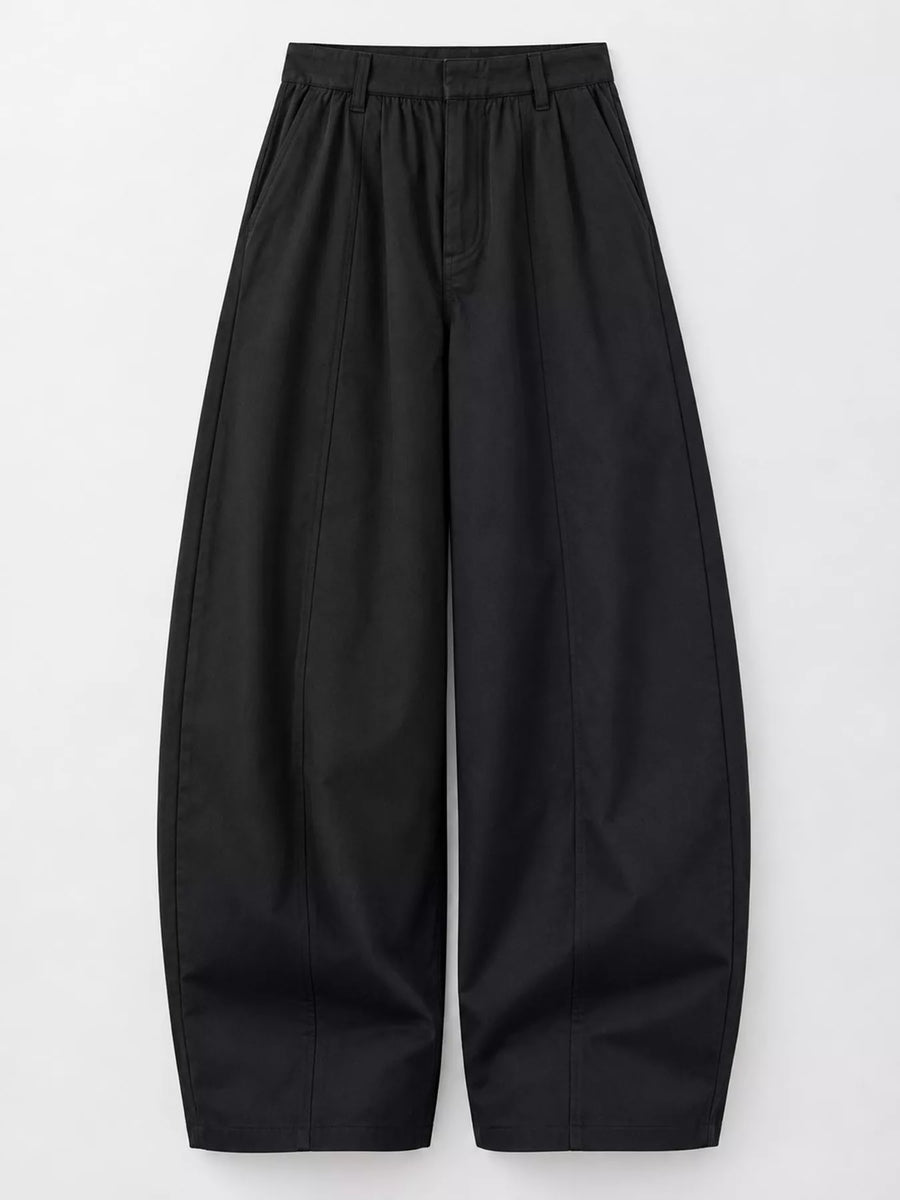 Black wide-leg cropped trousers with a high-waisted, elasticized waistband and front pleats, shown flat on a light gray background.