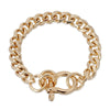 A gold-colored rounded cuban link chain bracelet with a horseshoe clasp.