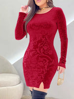 Red patterned dress worn by a person with a neutral background