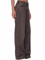 A person wearing high-waisted, wide-leg brown jeans against a plain white background.