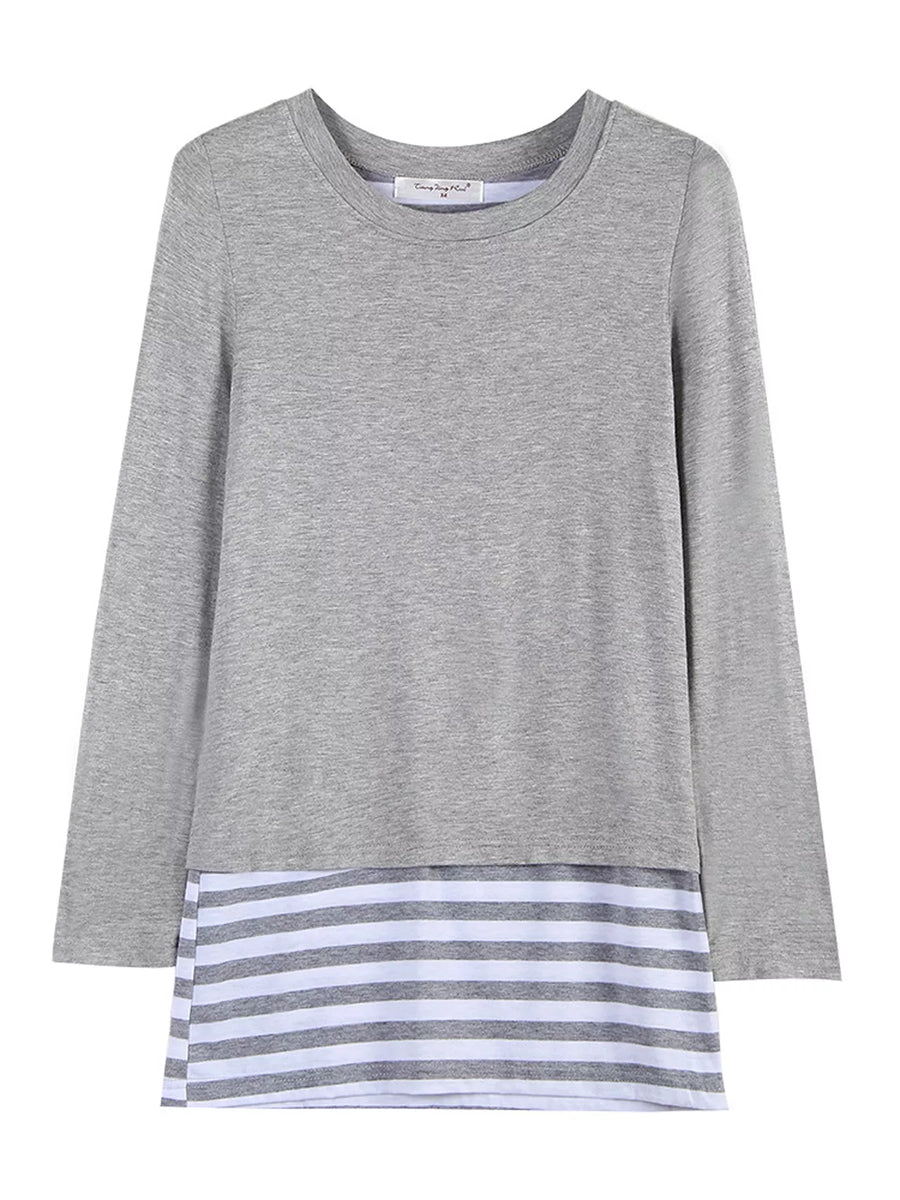 A long-sleeve gray tunic top with a contrasting striped hem. The top is heather gray with a crew neck, and the bottom hem features horizontal stripes in gray, white, and light blue.