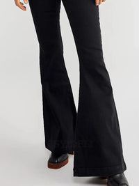 Black flared pants on a white background