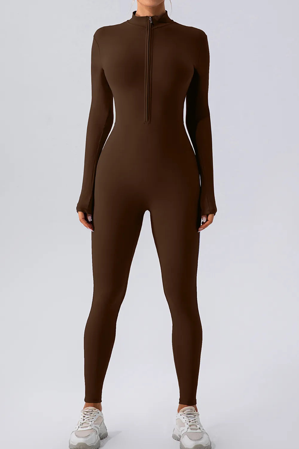 Brown bodysuit worn by a person on a white background