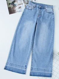 Light blue jeans on a white background