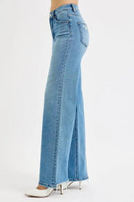 Light blue wide-leg jeans on a white background