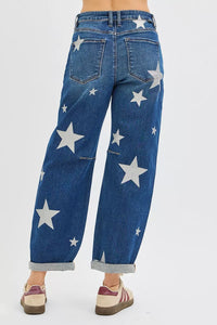 Blue jeans with star patterns on a white background