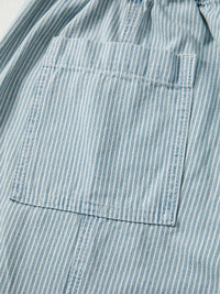 Close-up of a blue and white striped shirt with a pocket