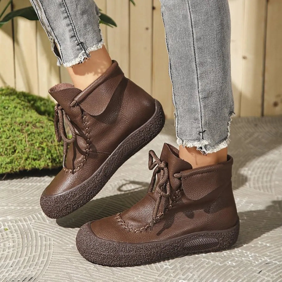 Woman wearing brown boots