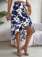 Woman wearing a blue floral skirt in an indoor setting