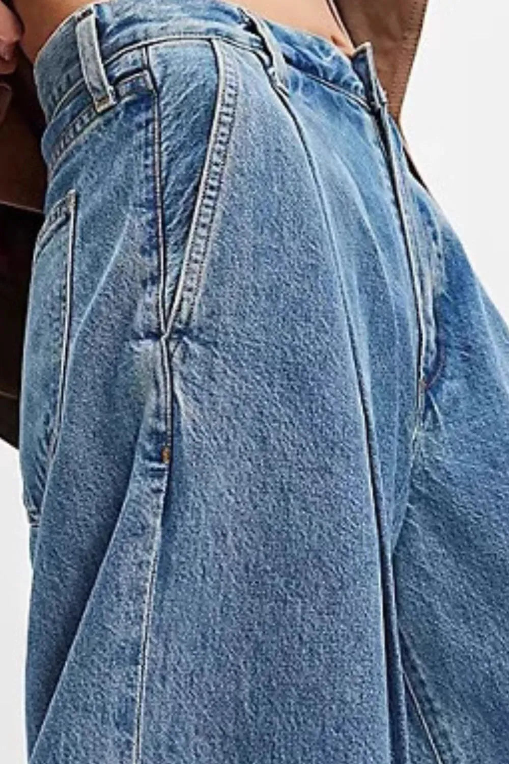 Close-up of blue jeans with a blurred background