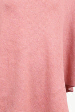 Close-up of a pink textured fabric