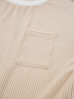 Close-up of a beige corduroy shirt with a pocket