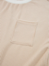 Close-up of a beige corduroy shirt with a pocket
