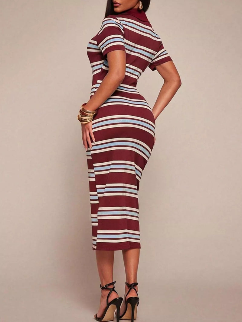 Woman wearing a striped dress with a plain background
