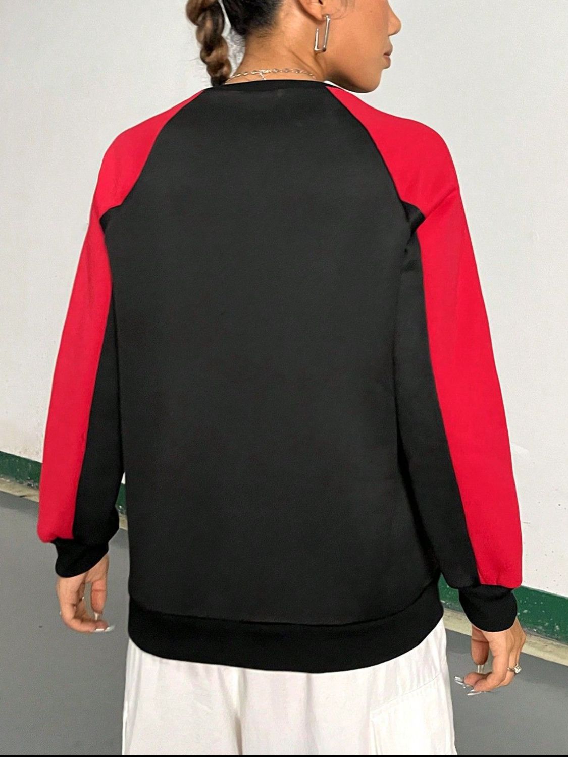 View of the back of Letter Graphic Round Neck Long Sleeve Sweatshirt