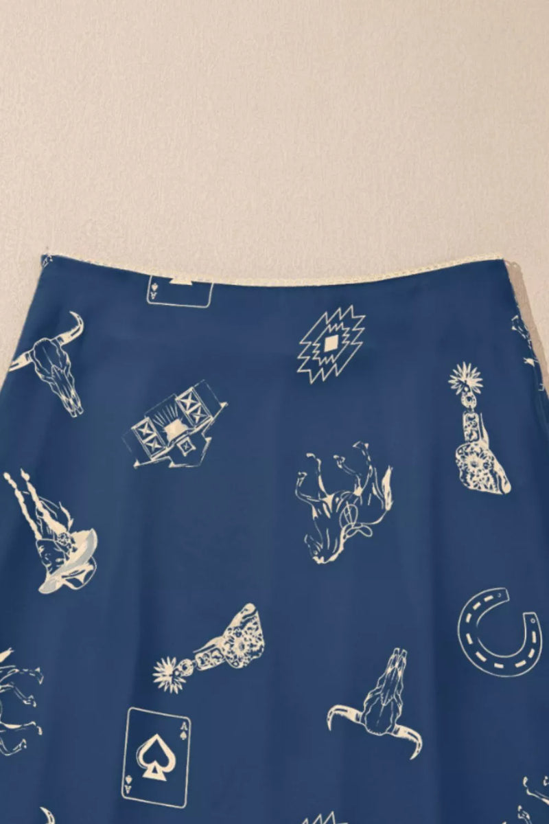 Blue fabric with white graphic designs on a beige background