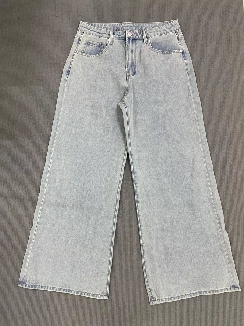 Light blue jeans on a gray background