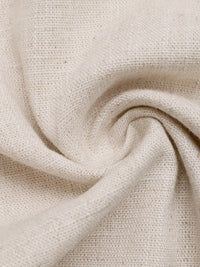 Close-up of beige fabric with a textured pattern