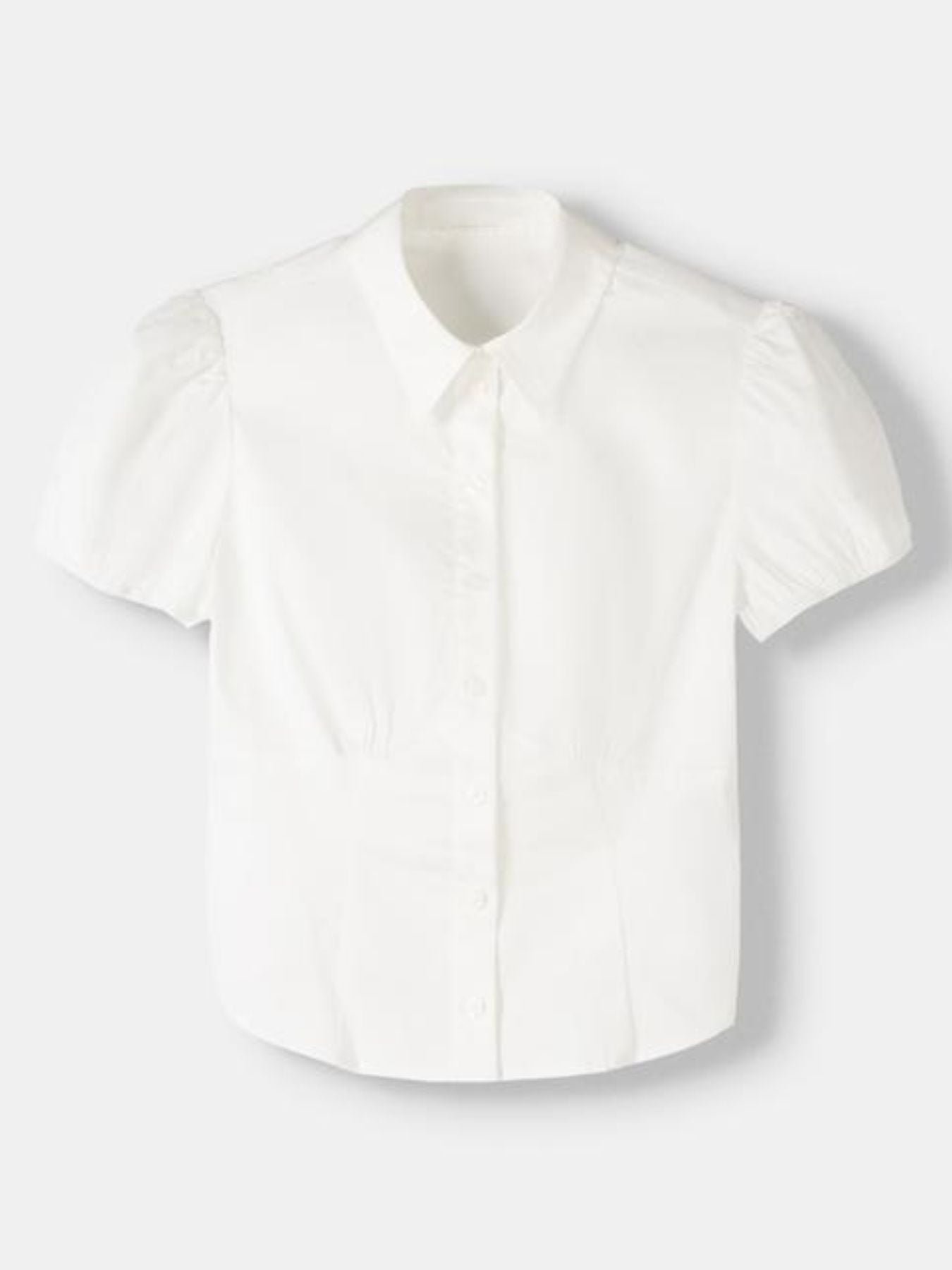 White blouse on a light gray background