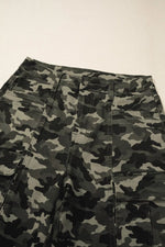 Camouflage pants on a plain background