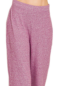 Pink patterned pants on a white background