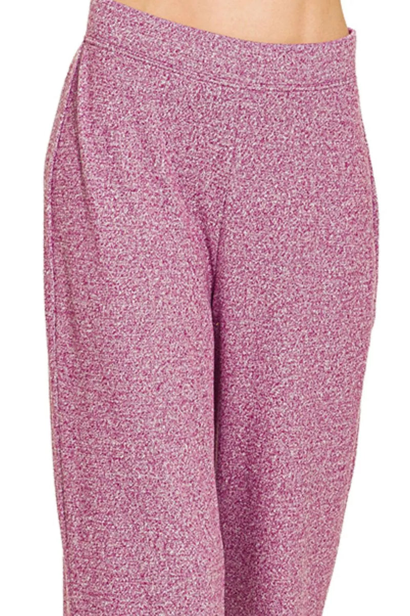 Pink patterned pants on a white background