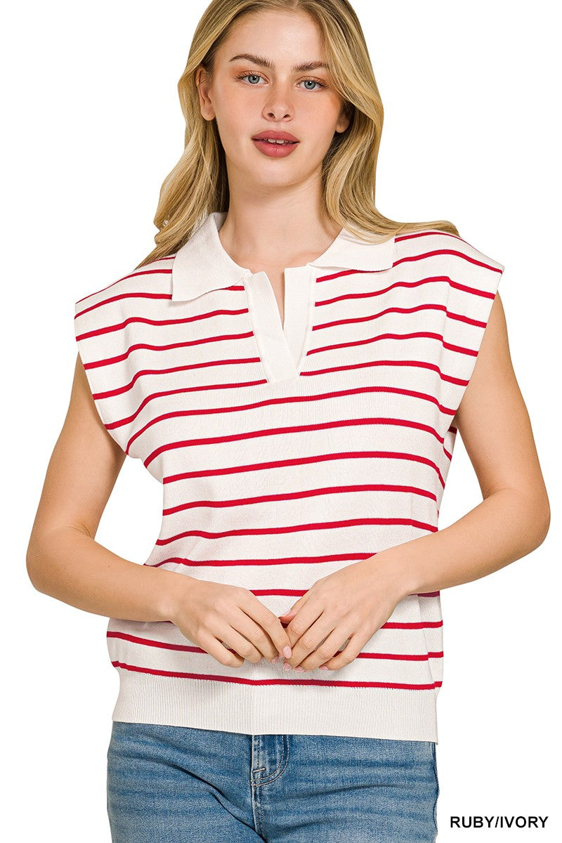 Woman wearing a red and white striped sleeveless shirt with a plain background