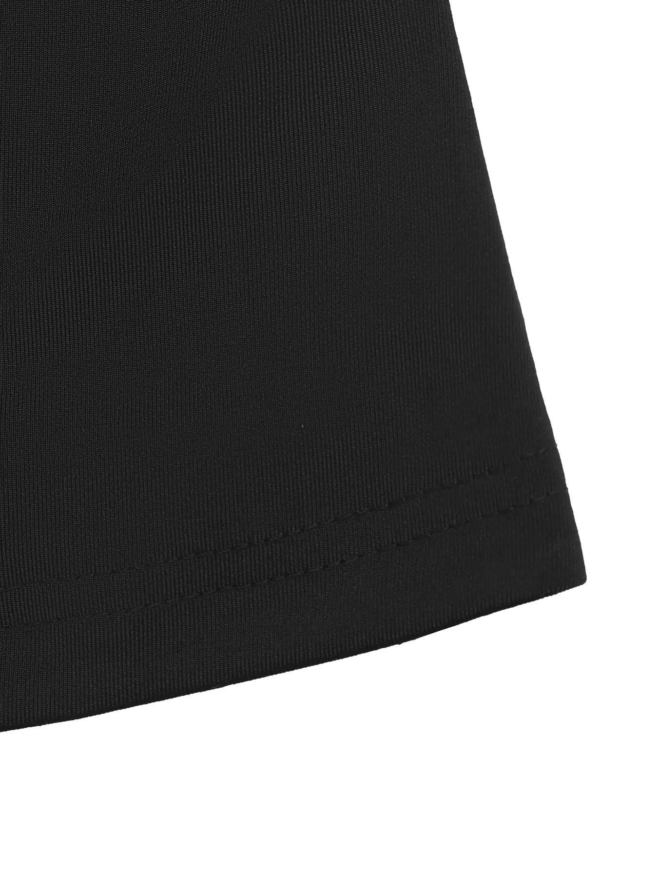 Close-up of a black fabric corner on a white background