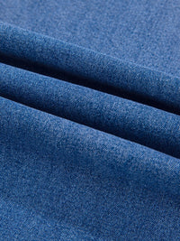 Close-up of blue fabric with a textured pattern