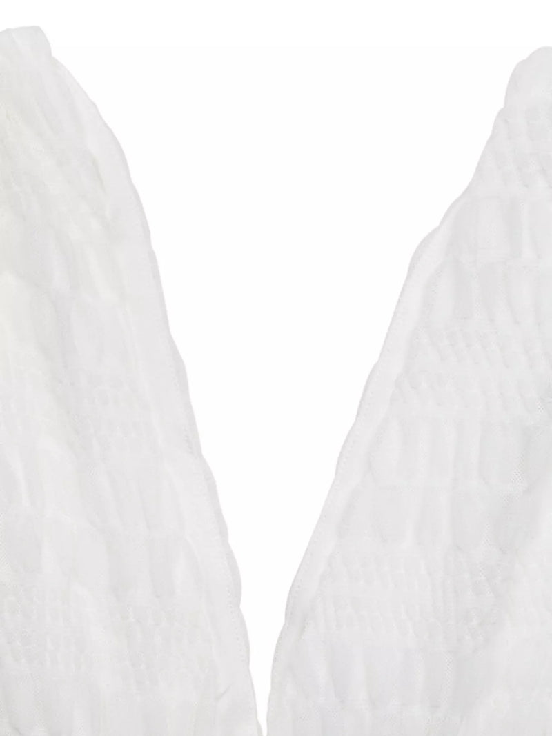 Close-up of a white fabric texture on a white background