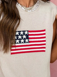 Beige sleeveless sweater with American flag design on a pink background