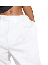 White pants worn by a person on a white background