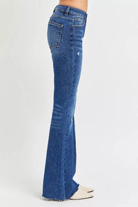 Blue flared jeans on a white background