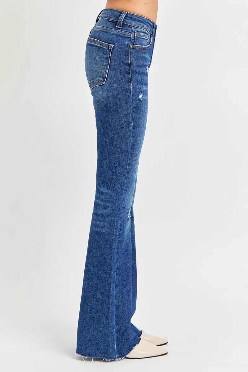 Blue flared jeans on a white background